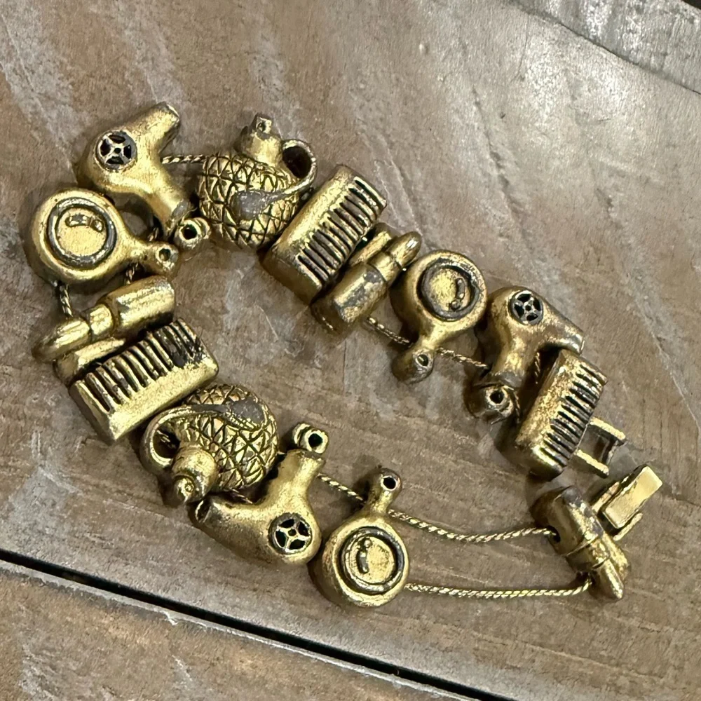 Vintage Hair and Makeup Gold Tone Charm Bracelet